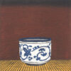 Nana Shiomi Japanese woodcut of blue and white ceramic bowl on stage. interior view, linited edition print